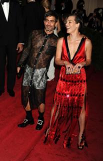 Milla Jovovich feet photo thumbnail