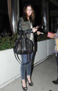 Lily Collins feet photo thumbnail