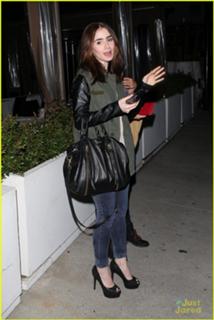 Lily Collins feet photo thumbnail