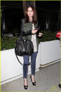 Lily Collins feet photo thumbnail