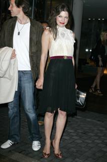 Milla Jovovich feet photo thumbnail