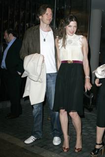 Milla Jovovich feet photo thumbnail