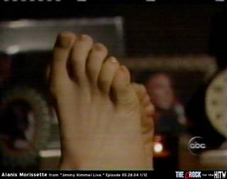 Alanis Morissette feet photo thumbnail