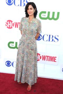 Carrie-Anne Moss feet photo thumbnail