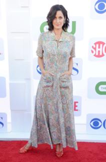 Carrie-Anne Moss feet photo thumbnail