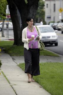 Carrie-Anne Moss feet photo thumbnail