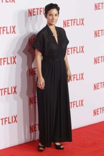 Carrie-Anne Moss feet photo thumbnail