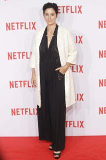 Carrie-Anne Moss feet photo thumbnail