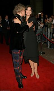Carrie-Anne Moss feet photo thumbnail