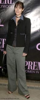 Carrie-Anne Moss feet photo thumbnail