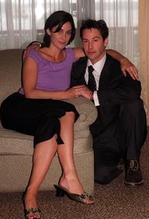 Carrie-Anne Moss feet photo thumbnail