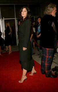 Carrie-Anne Moss feet photo thumbnail