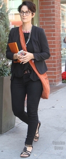 Carrie-Anne Moss feet photo thumbnail