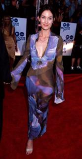 Carrie-Anne Moss feet photo thumbnail