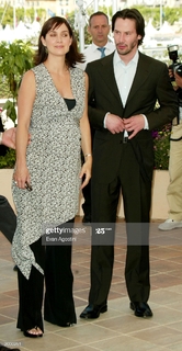 Carrie-Anne Moss feet photo thumbnail
