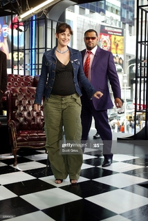 Carrie-Anne Moss feet photo thumbnail