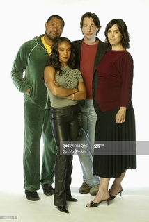 Carrie-Anne Moss feet photo thumbnail