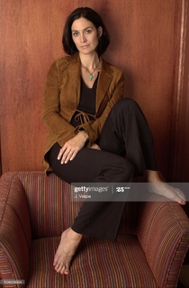 Carrie-Anne Moss feet photo thumbnail