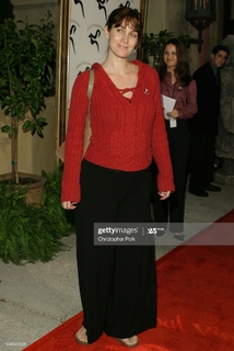 Carrie-Anne Moss feet photo thumbnail