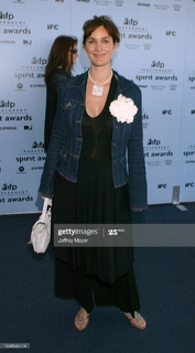 Carrie-Anne Moss feet photo thumbnail