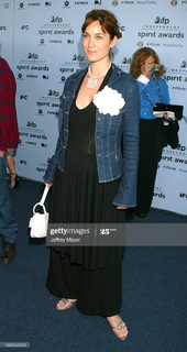 Carrie-Anne Moss feet photo thumbnail