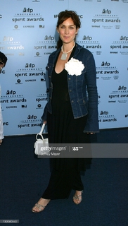 Carrie-Anne Moss feet photo thumbnail