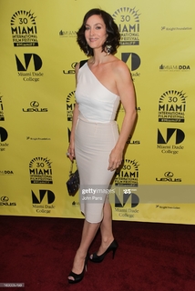 Carrie-Anne Moss feet photo thumbnail