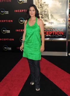 Carrie-Anne Moss feet photo thumbnail