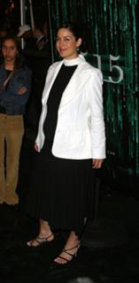 Carrie-Anne Moss feet photo thumbnail