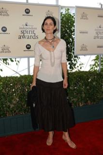 Carrie-Anne Moss feet photo thumbnail