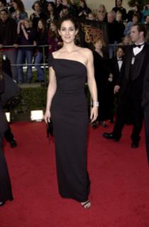Carrie-Anne Moss feet photo thumbnail