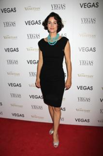 Carrie-Anne Moss feet photo thumbnail