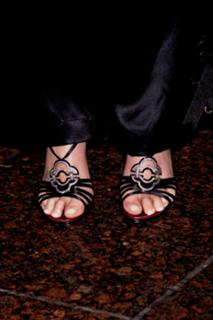 Charlize Theron feet photo thumbnail