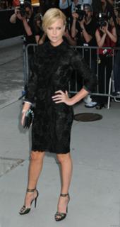 Charlize Theron feet photo thumbnail