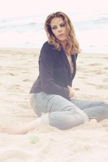 Claudia Gerini feet photo thumbnail