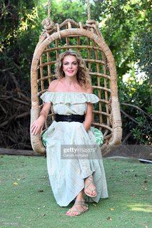 Claudia Gerini feet photo thumbnail