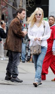 Dakota Fanning feet photo thumbnail