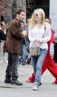 Dakota Fanning feet photo thumbnail