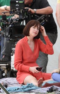 Dakota Johnson feet photo thumbnail