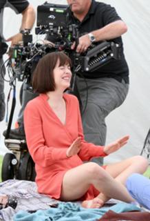 Dakota Johnson feet photo thumbnail