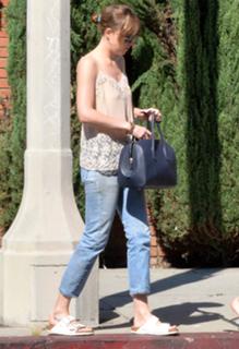 Dakota Johnson feet photo thumbnail