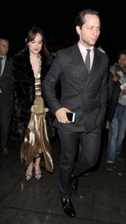 Dakota Johnson feet photo thumbnail