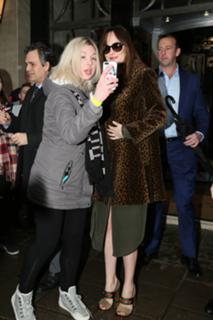 Dakota Johnson feet photo thumbnail