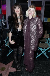 Dakota Johnson feet photo thumbnail