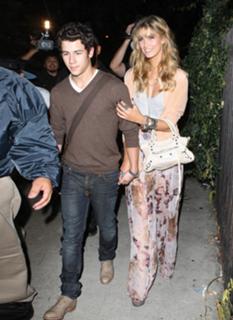 Delta Goodrem feet photo thumbnail