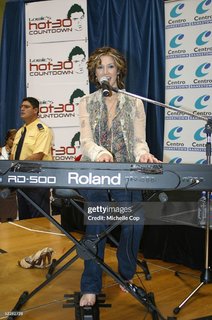 Delta Goodrem feet photo thumbnail