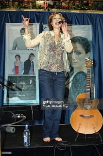 Delta Goodrem feet photo thumbnail