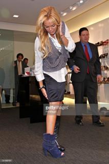 Dina Lohan feet photo 14