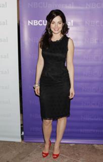 Erica Durance feet photo thumbnail
