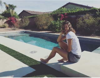 Garbiñe Muguruza feet photo thumbnail